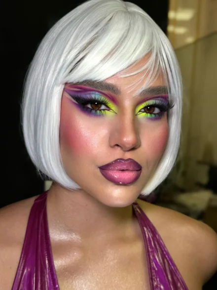 Dramatic colorful makeup with short platinum blonde wig by Anna Balantinou