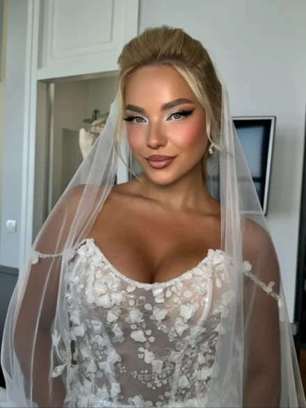 Elegant bridal makeup with veil by Anna Balantinou